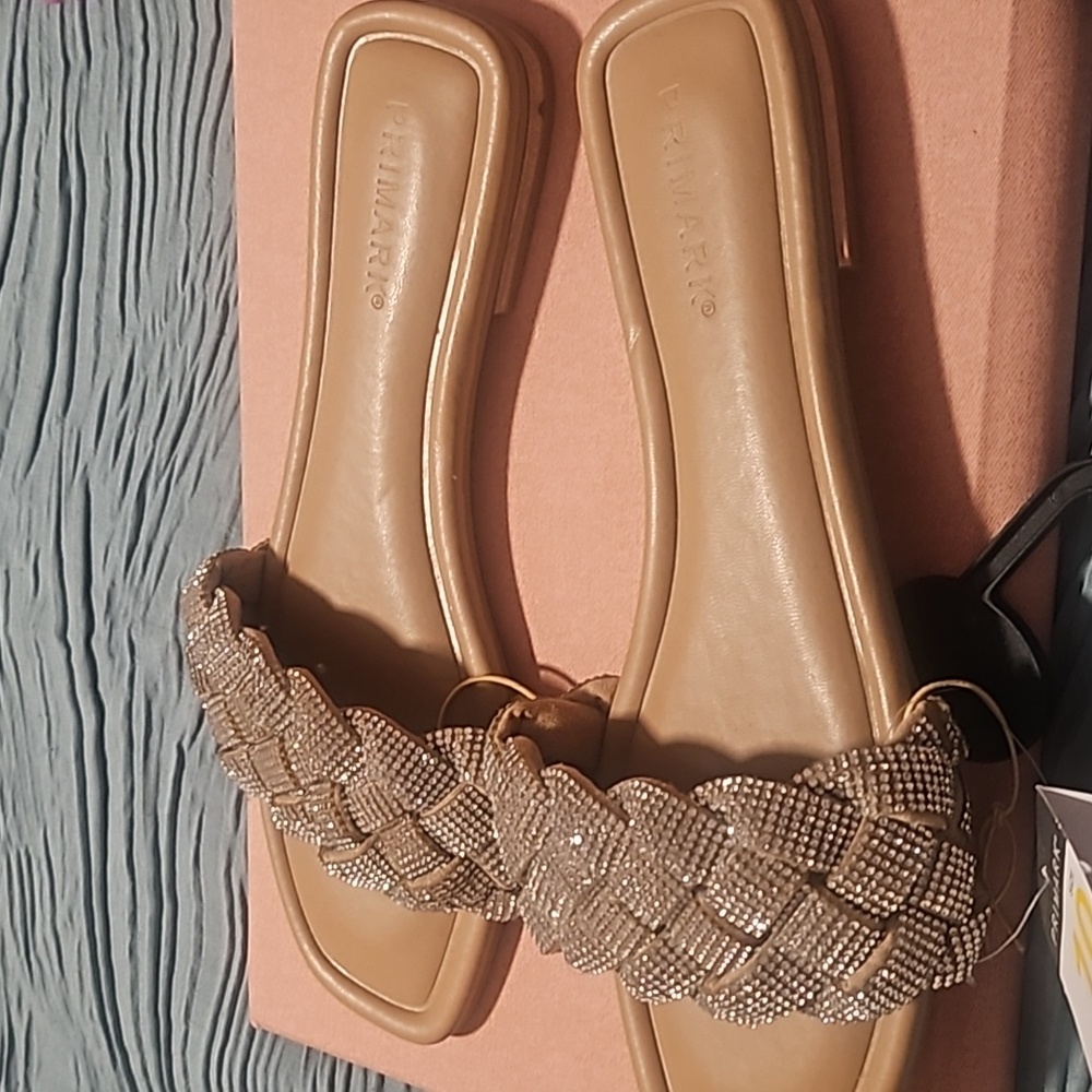 Gold colored shiny sandals
